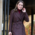 Kate Middleton shows us how to notch up your layering game this winter in burgundy separates and tartan long coat