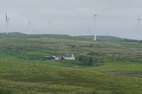 A derelict property in the middle of windfarm alley which appeared to have work being done on it