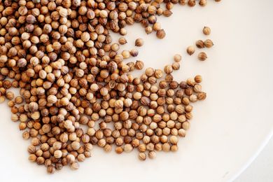 Whole coriander on a plate.