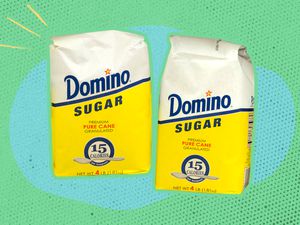 domino sugar packets on a blue and green illustrated background