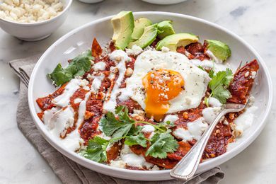 A plate of chilaquiles rojos.