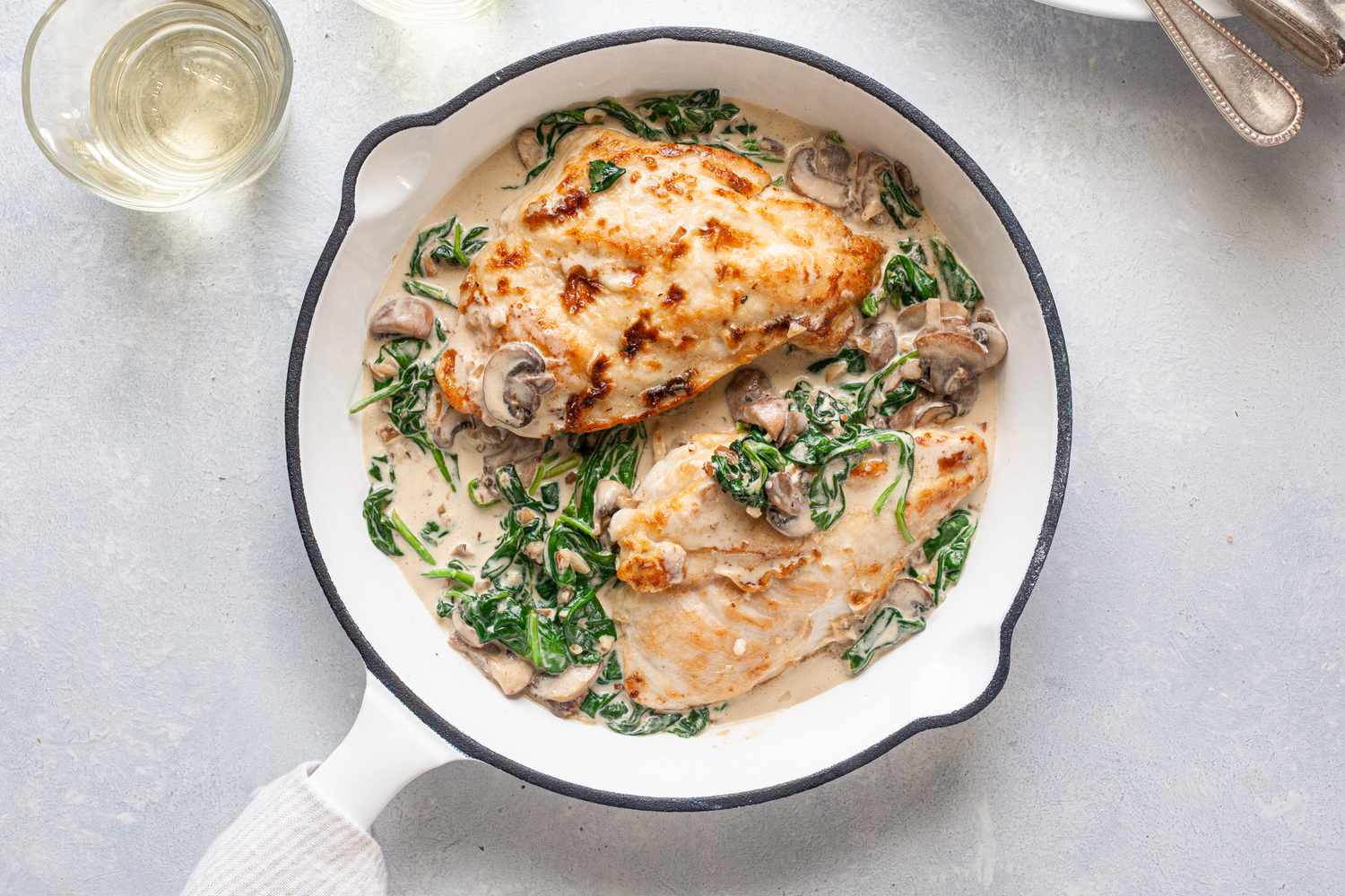 Creamy chicken Florentine in skillet.