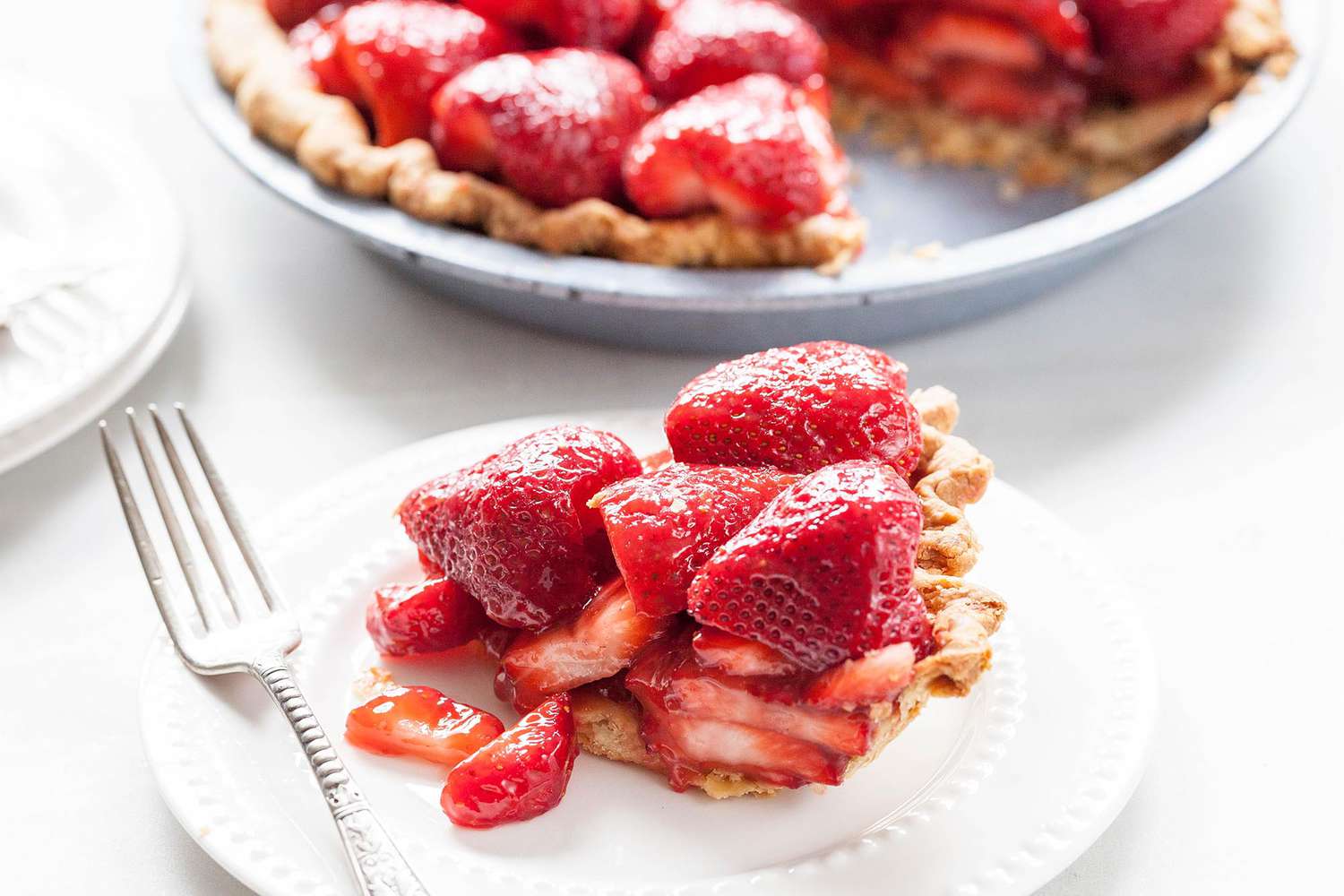 Homemade Strawberry Pie slice on serving plate