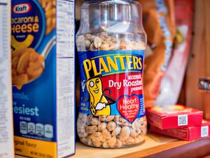 jar of planter's in a kitchen cabinet 