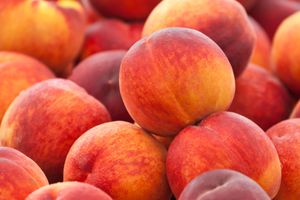 Close-up on a display or ripe peaches