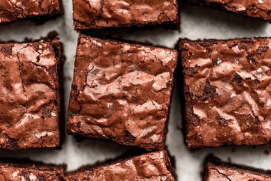 Brownies on a piece of parchment paper