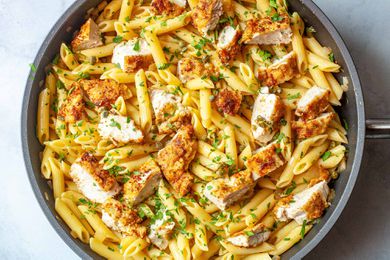 Overhead view of a skillet of chicken piccata pasta