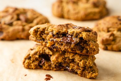 halved chocolate chunk cookie stacked 