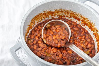 Overhead view of a pot of cowboy baked beans.