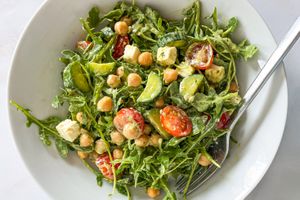 salad dressed with 2-ingredient salad dressing in a bowl