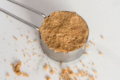 Brown sugar in measuring cup