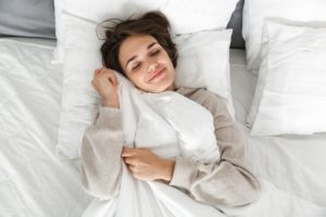 woman sleeping overhead view