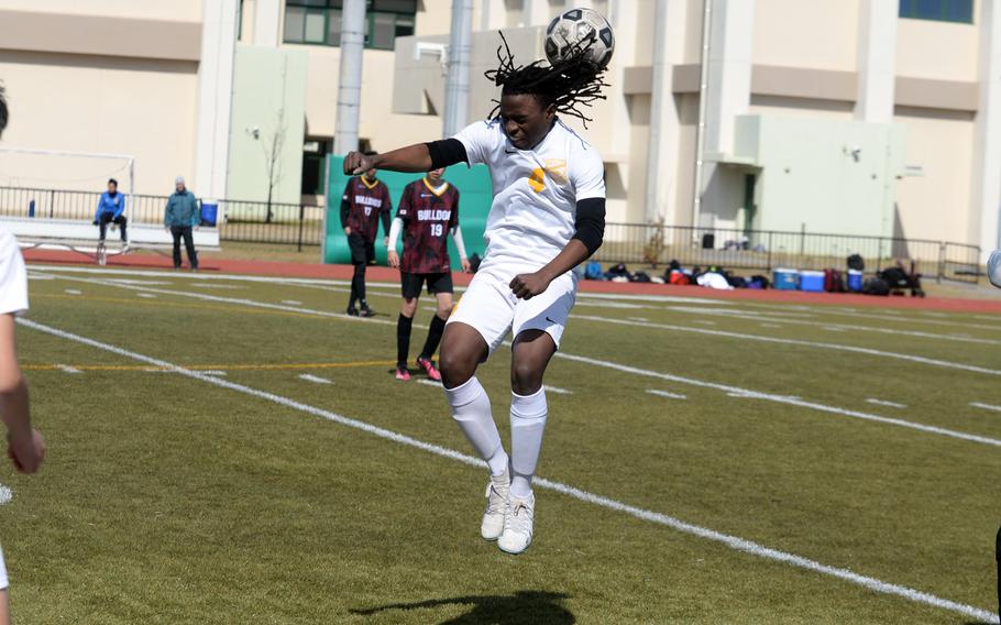 Yokota's Kysiem Banks goes up to head the ball against Marist during Saturday's Perry Cup semifinal, won by the Bulldogs 1-0.