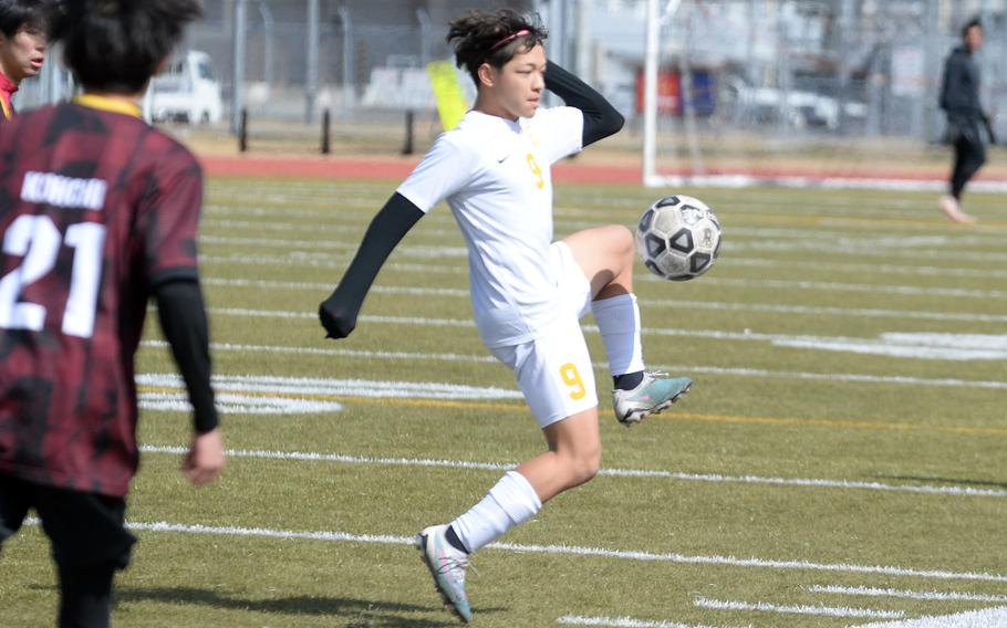 Yokota's Evan Horne tries to steady the ball against Marist during Saturday's Perry Cup semifinal, won by the Bulldogs 1-0.