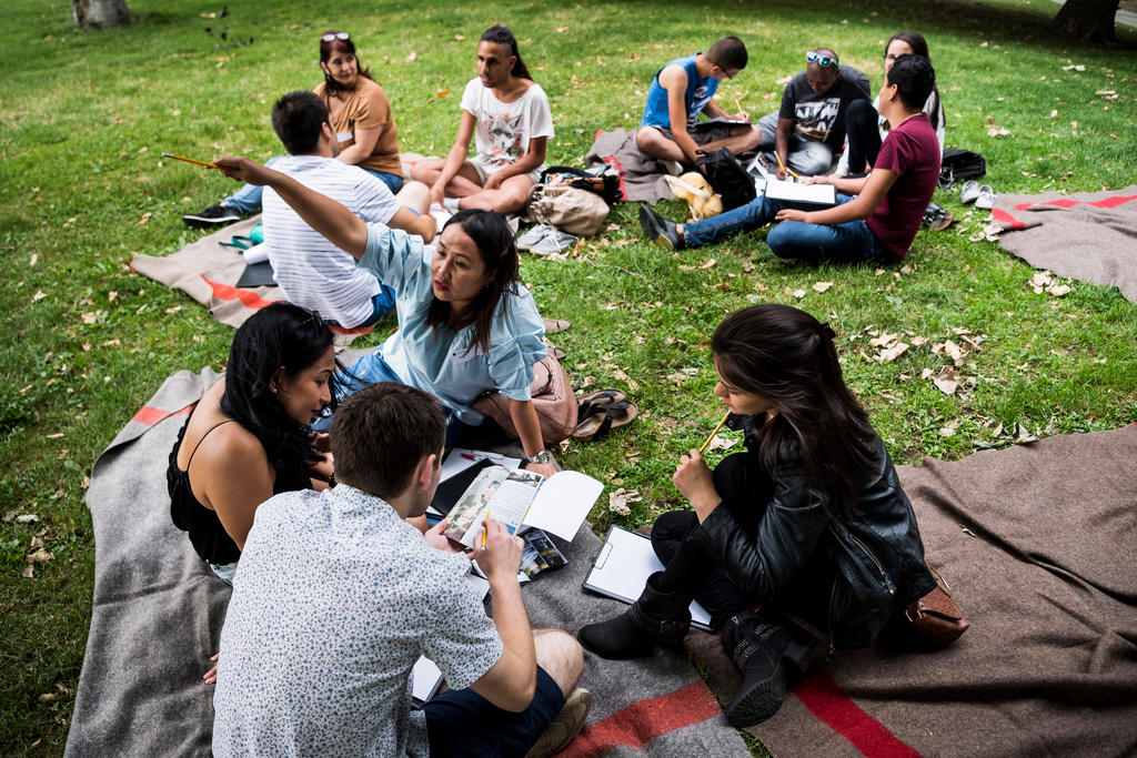 Young people sitting outside