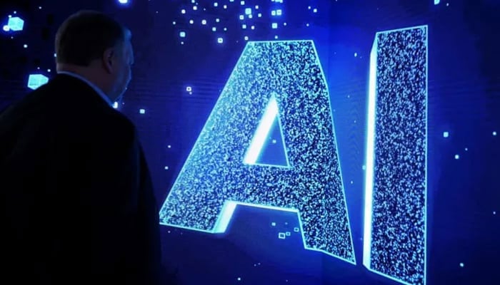 A visitor watches an AI sign on an animated screen at the Mobile World Congress, the telecom industry’s biggest annual gathering, in Barcelona. — AFP/File