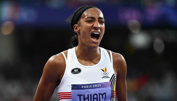 Belgiums Nafissatou Thiam reacts after competing in the womens heptathlon 800m of the athletics event at the Paris 2024 Olympic Games in Paris, on August 9, 2024. — AFP