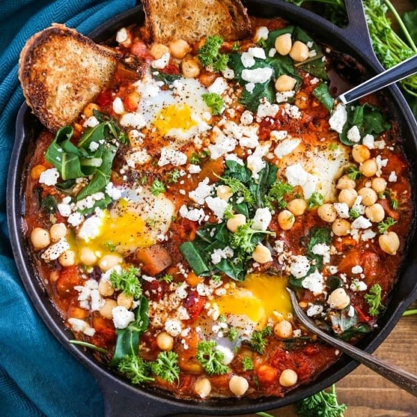 Eggplant Chickpea and Chard Shakshuka - a healthy delicious poached eggs in tomato sauce recipe.