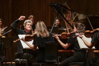 Ryan Wigglesworth conducting the Knussen Chamber Orchestra from the piano