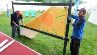 Baillie Gifford sponsorship signs are removed from the Hay Festival last month