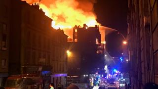 Flames roar from the roof of Glasgow School of Art during the second fire, in 2018