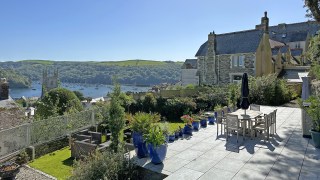 The terrace of this Cornish home has views over the River Fowey