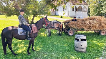 Alice Thomson on horseback in Transylvania