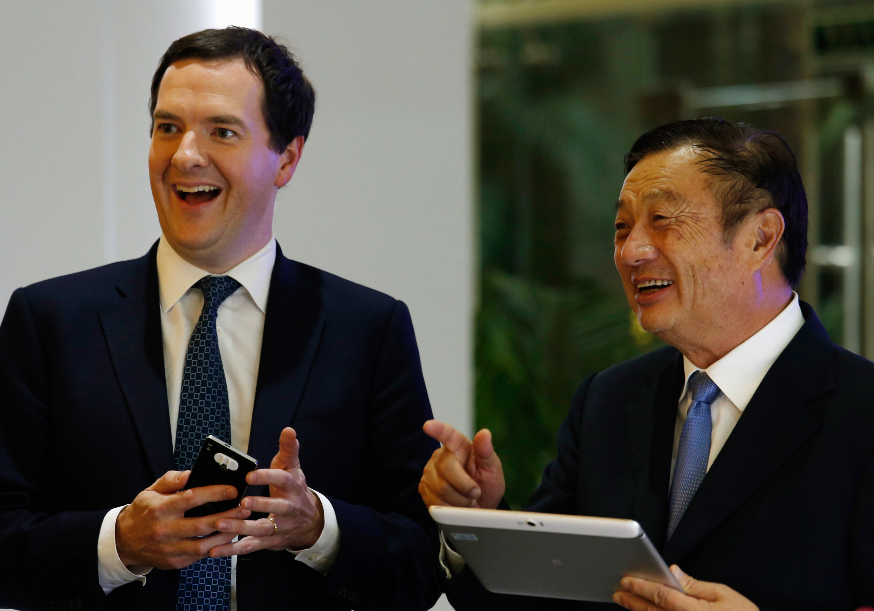 George Osborne and Ren Zhengfei at Huawei headquarters.