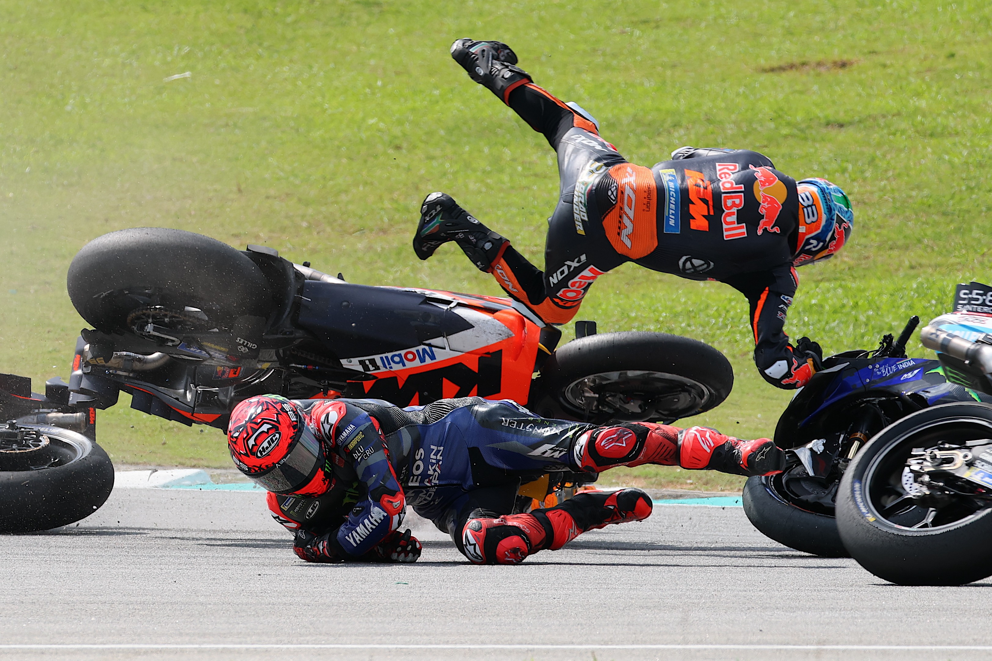 Jack Miller, bottom, and his team-mate Brad Binder crashed at the second corner of the first lap during the Malaysia Moto GP race in Sepang at the weekend. KTM, the riders’ team, confirmed that both men avoided serious injury