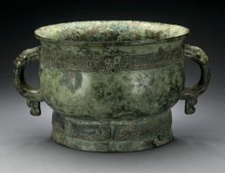 ancient ritual grain server with dragon handles