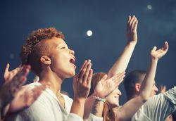 group of people applauding and cheering