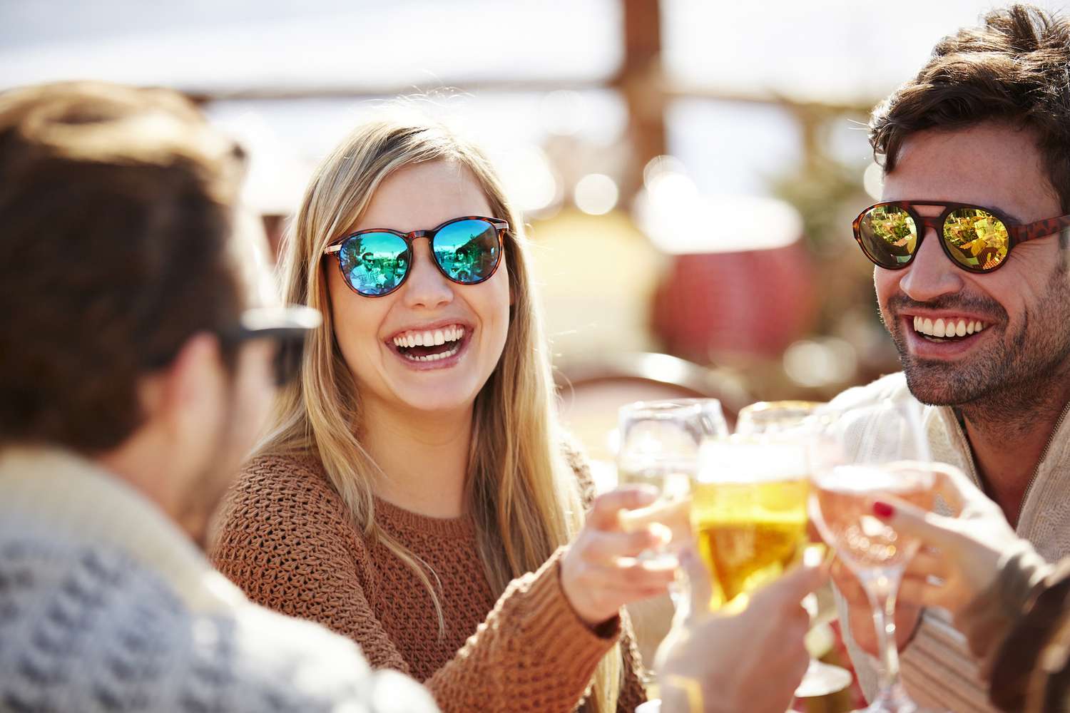 Friends toasting each other with wine