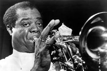 Louis Armstrong playing trumpet