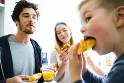 A family eating bread