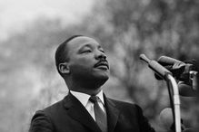 MONTGOMERY, AL - MARCH 25: Dr. Martin Luther King, Jr. speaking before crowd of 25,000 Selma To Montgomery, Alabama civil rights marchers, in front of Montgomery, Alabama state capital building. On March 25, 1965 in Montgomery, Alabama.