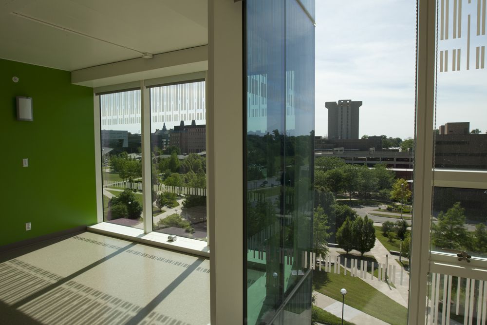 Dorm room window overlooking campus