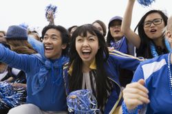 Group of Chinese people at a sporting event