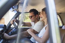 Couple driving in a car