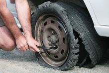 replacing a tire blowout