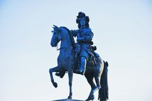 Low Angle View Of Louis Xiv Statue Against Clear Sky