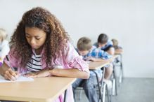 Students taking a test in classroom