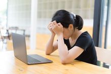 student very exhausted after study in university with laptop computer