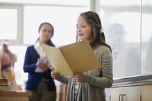 female middle school student giving presentation