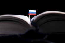Russian flag in the middle of a book.