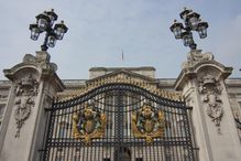 National Royal Symbols of England and Front Door of Buckingham Palace, London, Britain