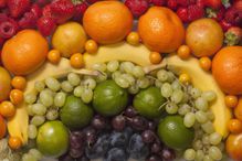 An abstract arrangement of various fresh fruits, full frame