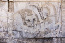 Bas Relief Carving of Lion Hunting a Bull in Persepolis, Shiraz, Fars Province, Iran.