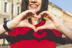 Woman's hands shaping heart