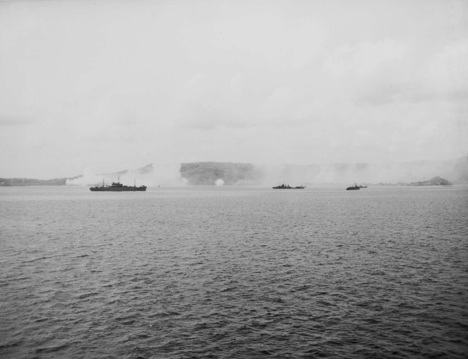 Allied warships firing at targets ashore on Guam.