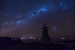 Panoramic view with Pachamama monumet and milkyway on Isla del Sol , Titicaca Lake